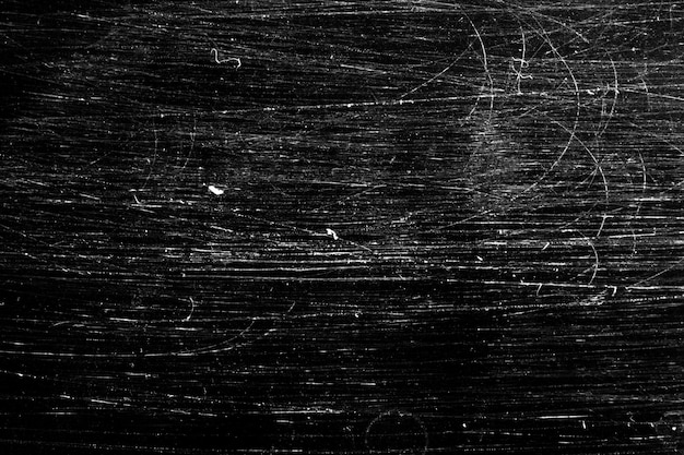White scratches on a black background. texture for design