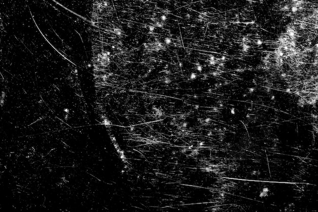 white scratches stained on a black background. template for design