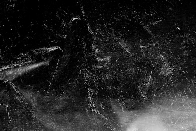 White scratches with spotsisolated on black background High quality photo
