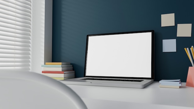 White screen computer laptop on working table at home office.