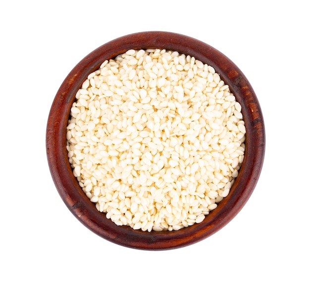 White sesame seed in bowl on white