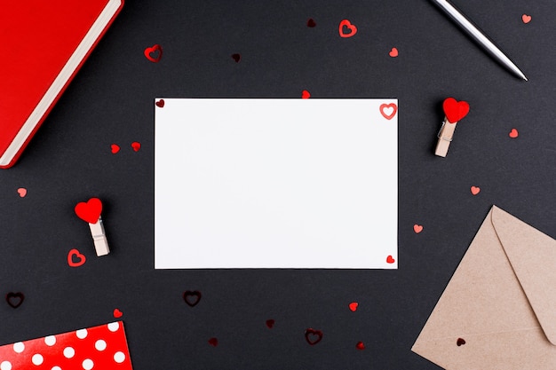 White sheet postcard place for text on Valentine's Day, Flat Lay