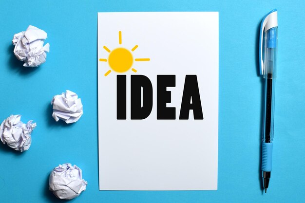 Photo a white sheet with the word idea on it