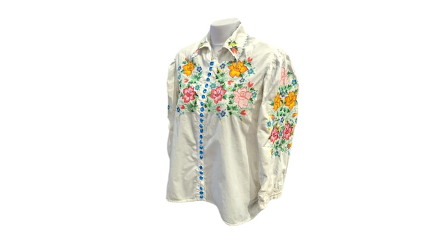 A white shirt with a floral pattern on it