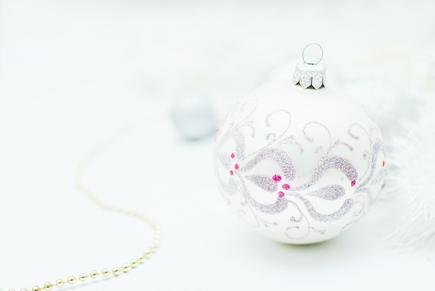 White and Silver Christmas decoration on white background