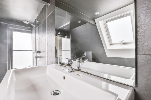 White sink with square mirror in luxury bathroom