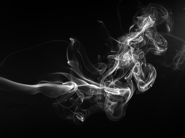 White smoke abstract on black background fire design