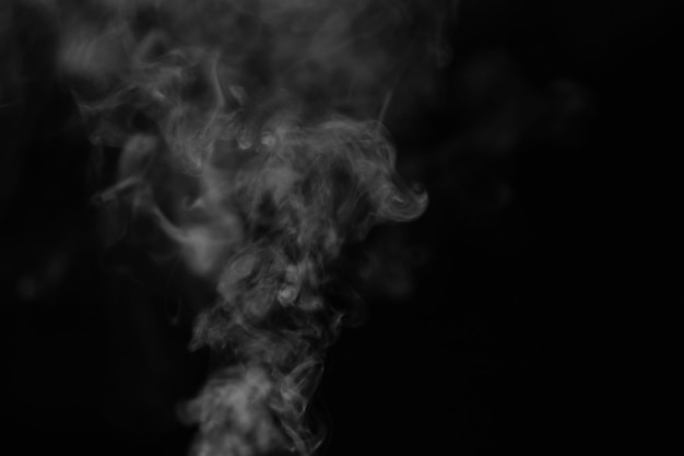 Premium Photo  Texture of steam on a black background