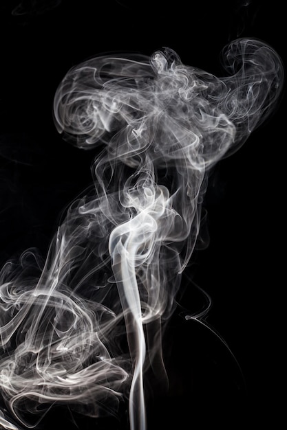 White smoke on black background