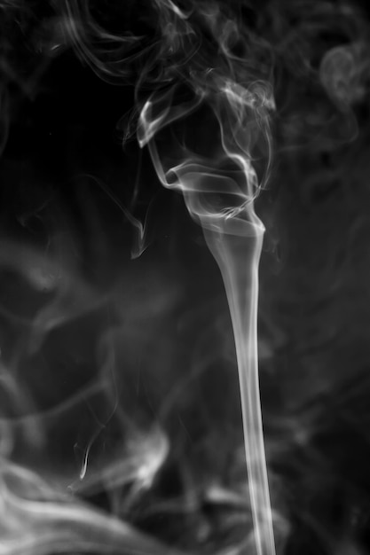 White smoke on black background