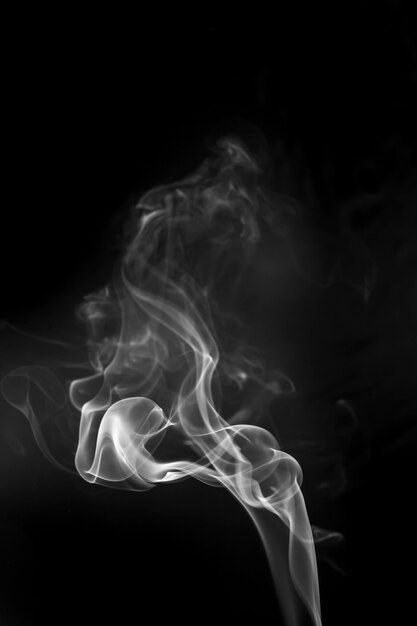 White smoke on black background