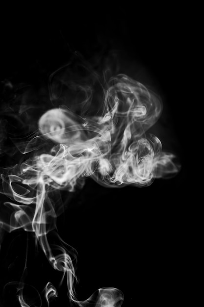 White smoke on black background.