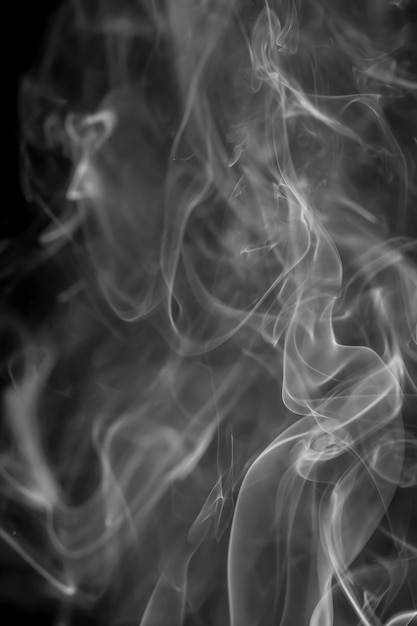 White smoke on black background