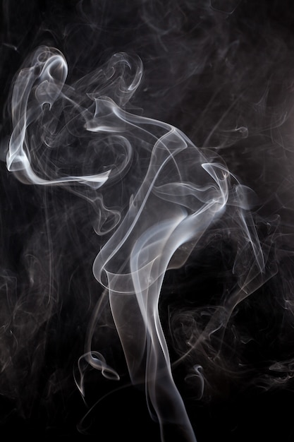 White smoke on a black background