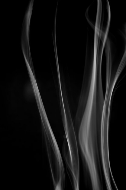 White smoke on black background.