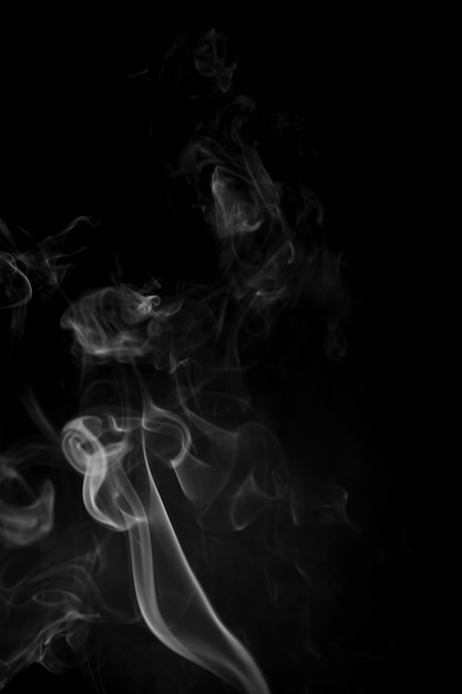 White smoke on black background.