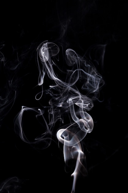 White smoke on black background.