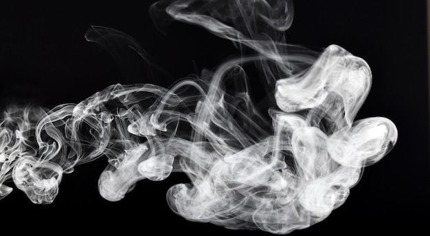 white smoke on black background