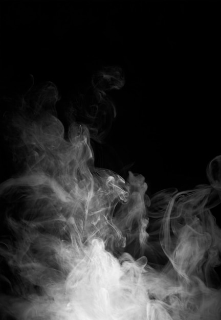 Photo white smoke on a black