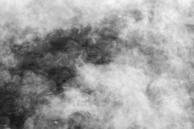 White smoke flow on dark background.