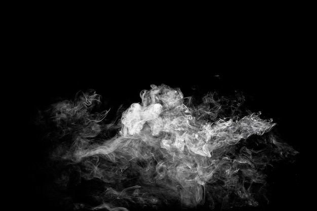 White smoke flow on dark background.