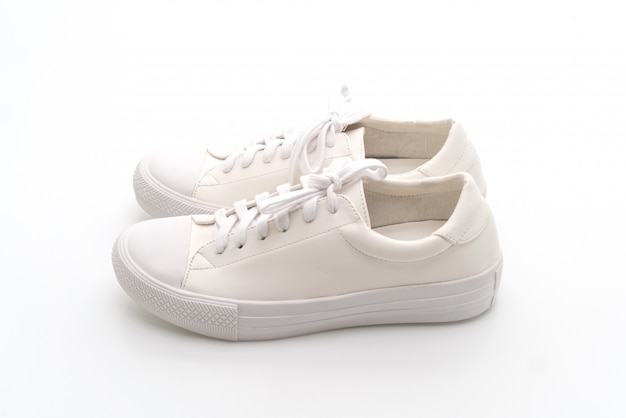 white sneakers on white background