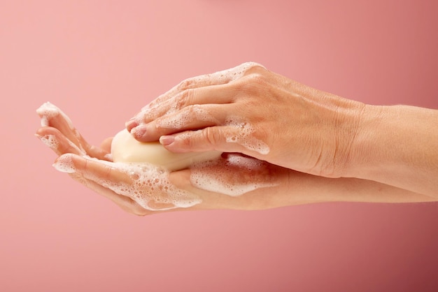 White soap in the hands of a natural woman