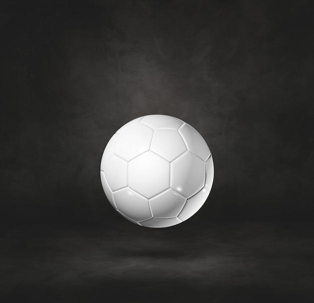 黒いスタジオの背景に分離された白いサッカーボール。 3Dイラスト