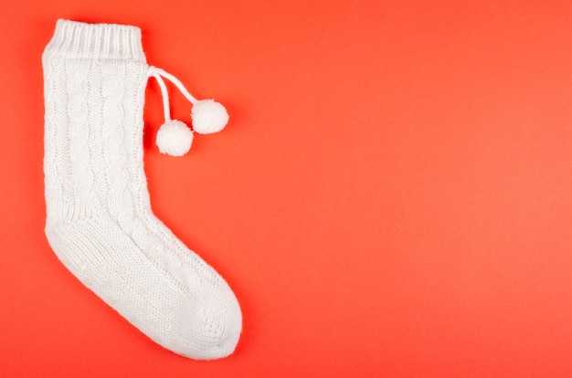 White socks with pom poms  composition.