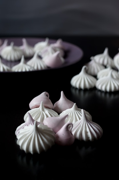 Photo white and soft pink meringues