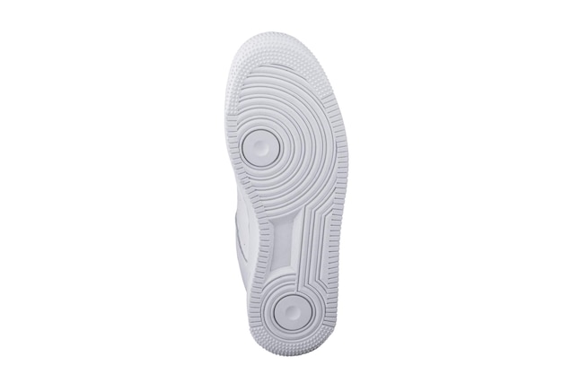 Photo white sole of shoes bottom of sneakers on a white background is insulated