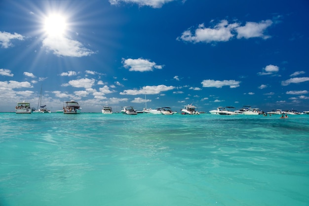 White speed boats and yachts in turquoise azure caribbean sea Isla Mujeres island Caribbean Sea Cancun Yucatan Mexico