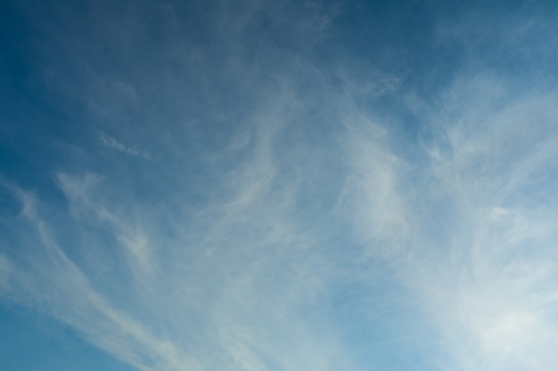 White Spindrift clouds on blue beauty sky - image