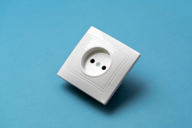 A white square home electric power socket