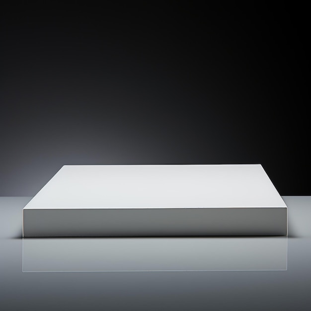 White square podium on a reflective surface with a black background