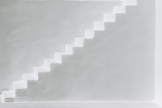 White stairs leading to terrace in Oia Santorini