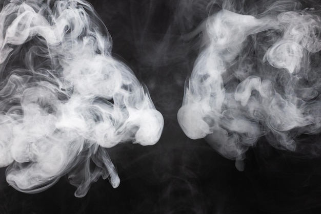 White steam on a black background