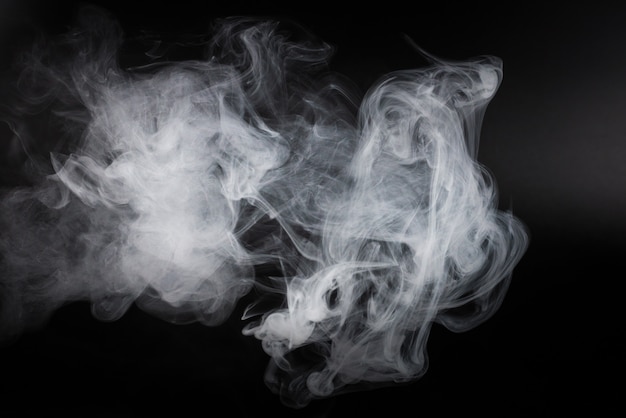 White steam on a black background.