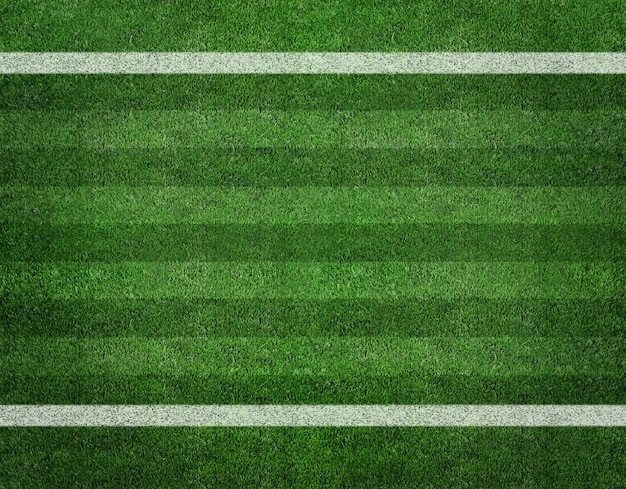 White stripe on the green soccer field from top view 