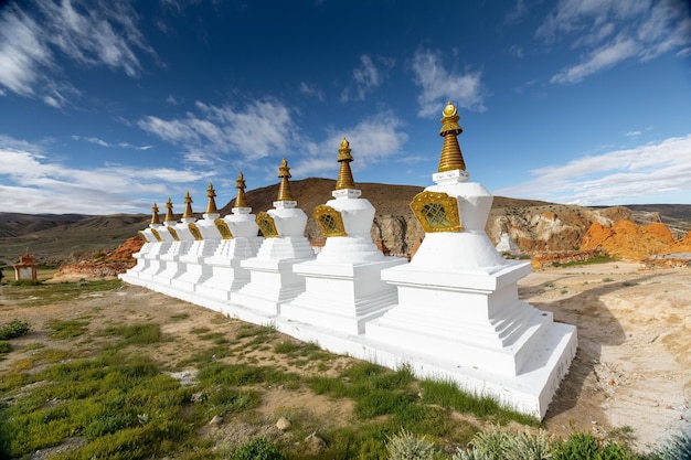 The white stupas in the old Monastery in sunshine day in summer in Tibet