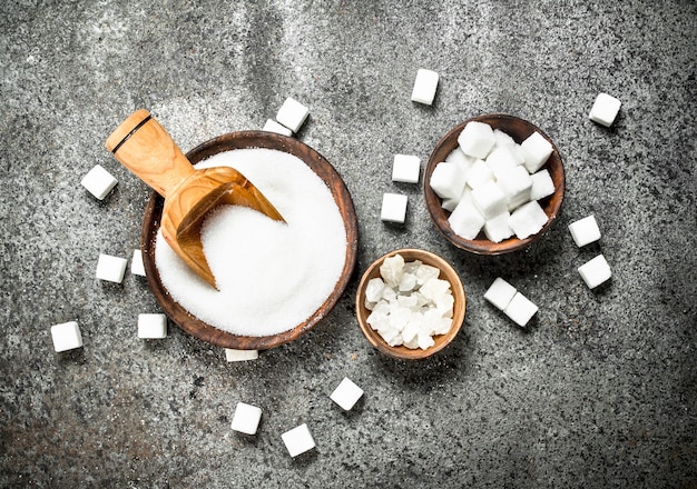 White sugar in bowls.