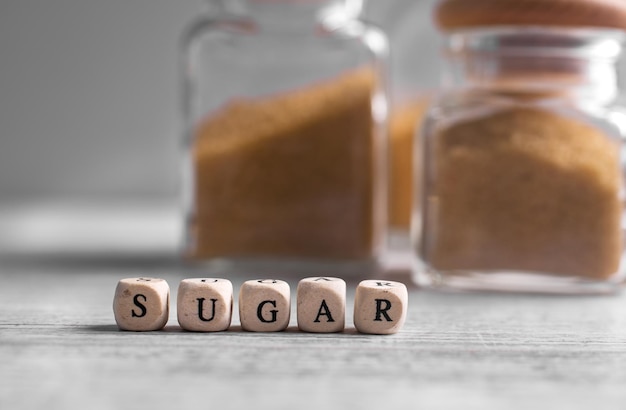 White sugar and brown sugar background. Sweet and tasty. Healthy and unhealthy lifestyle.