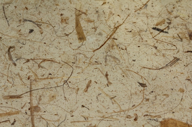 A white table with brown specks on it