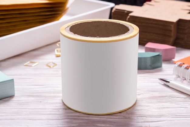 White  tape roll  on wooden office table