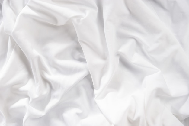 Белая текстура атласной ткани