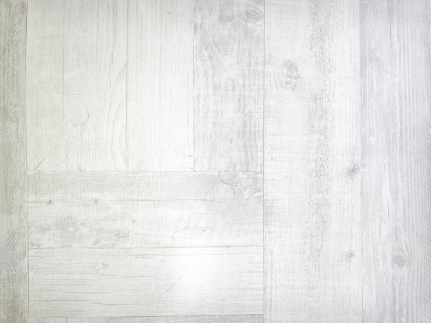 White texture of weathered wooden planks floor. Closeup