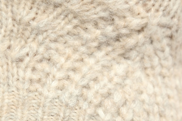 Photo white texture wool close-up, woven cloth, knitted fabric