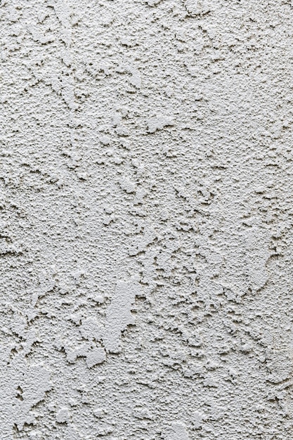 White textured background. Wall with textured coating