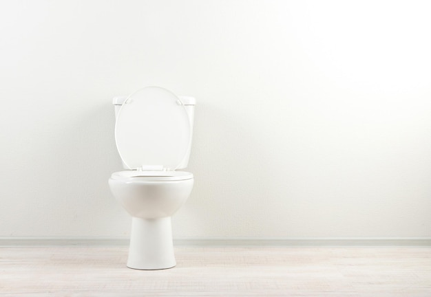 White toilet bowl in a bathroom