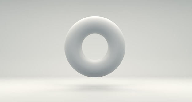 Foto torus bianco su uno sfondo grigio di studio concetto minimo rendering 3d monocromatico